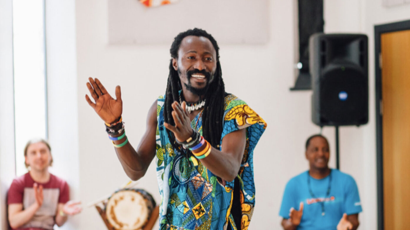 A photo of world-renowned Afrobeat musician Sens Sagna.
