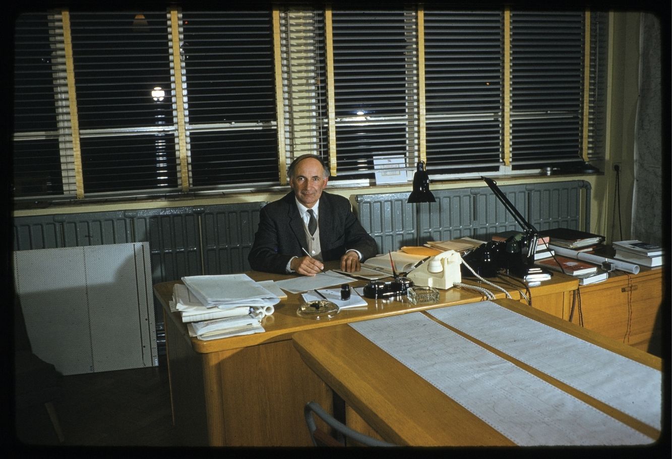 Sir Bernard Lovell sat behind his desk at the Jodrell Bank Observatory in 1959