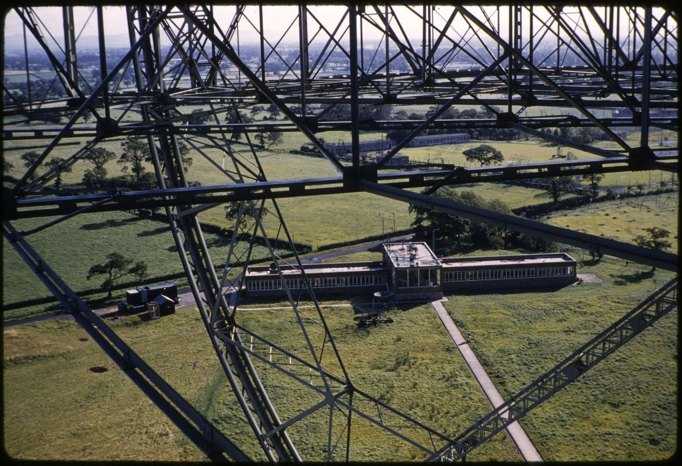 A building within fields viewed from a height