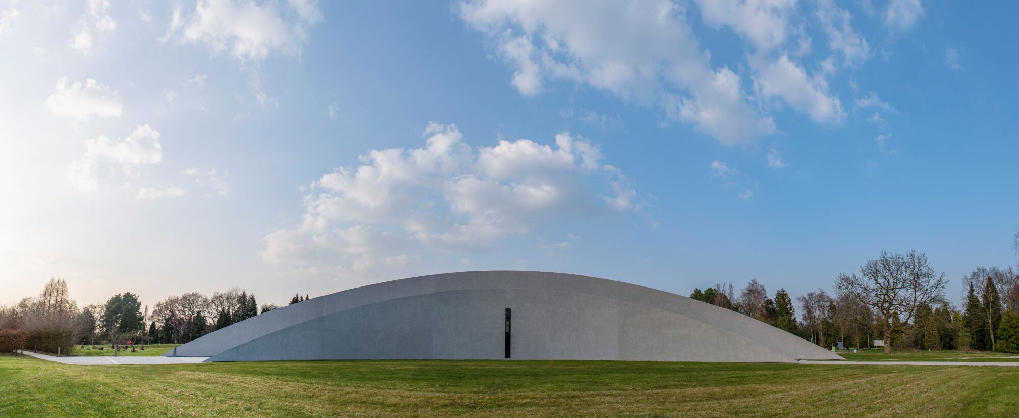 A photo of the First Light Pavilion exterior, including the meridian line.